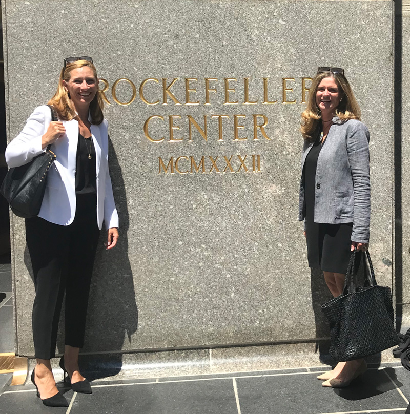 Claire Neary and Jen Morris standing outside Rockerfeller Center