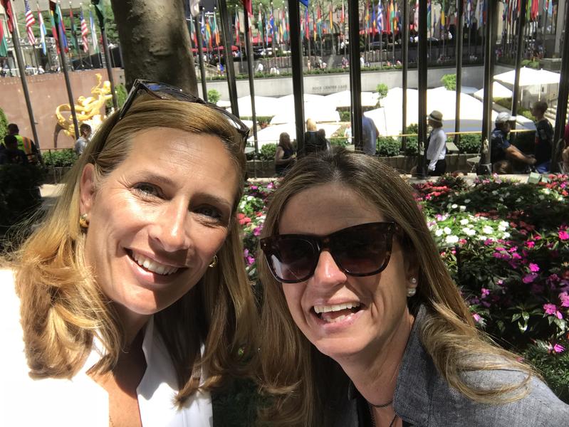 Claire Neary and Jen Morris smiling at the UN in NYC